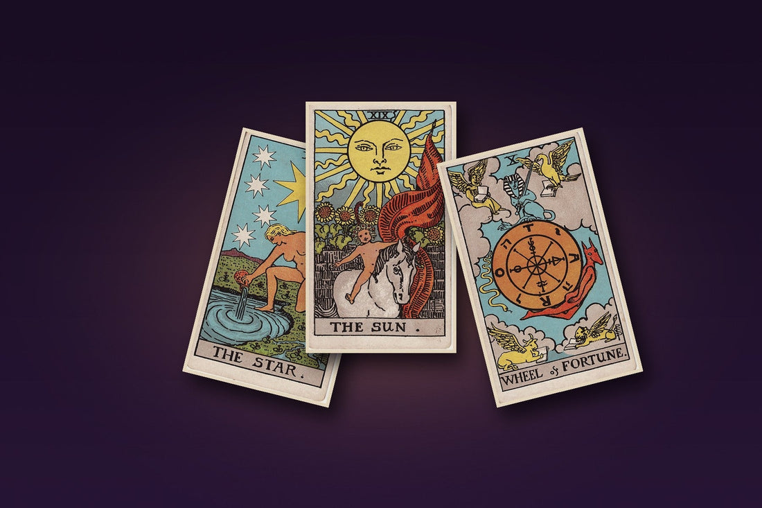 A fan of tarot cards spread across a table